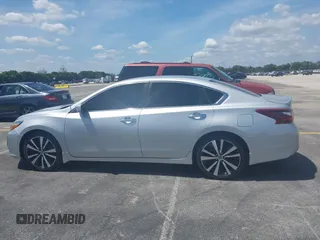 2017 Nissan Altima SV with VIN 1N4AL3AP2HC164553, listed as a IAAI auction lot 42215405 with 117,736 mi miles and . Bid and sale history available at DreamBid. Image 14.