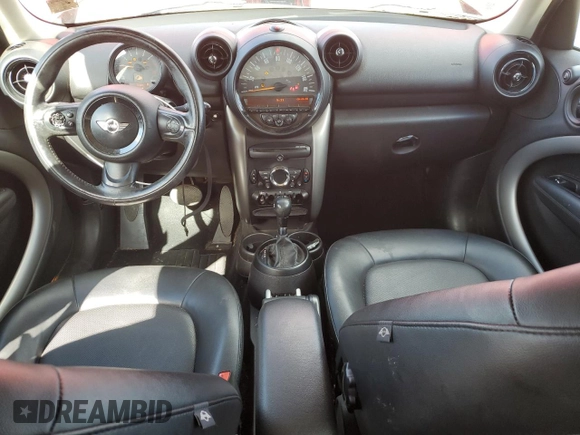 2015 MINI Countryman with VIN WMWZB3C58FWR44187, listed as a Copart auction lot 48236575 with 84,791 mi miles and Salvage Title. Bid and sale history available at DreamBid. Image 8.