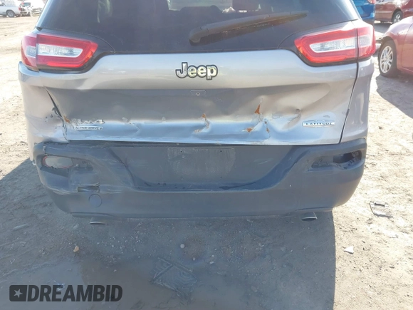 2014 Jeep Cherokee Latitude with VIN 1C4PJMCSXEW125737, listed as a IAAI auction lot 41863778 with 120,226 mi miles. Bid and sale history available at carsss.com. Image 6.