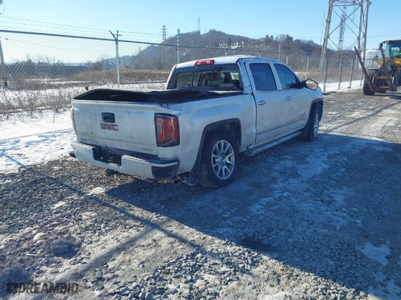 2018 GMC Sierra 1500 Denali with VIN 3GTU2PEC8JG519642, listed as a IAAI auction lot 41427185 with 111,596 mi miles. Bid and sale history available at carsss.com. Image 4.