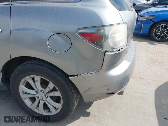 2010 Mazda CX-7 Touring z VIN JM3ER2W30A0319755, wystawiony jako IAAI lot #41786798 z przebiegiem 182 282 mil mil oraz . Historia ofert i sprzedaży dostępna na DreamBid. Obrazek 16.