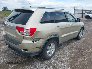 2011 Jeep Grand Cherokee Laredo with VIN 1J4RR4GG8BC558018, listed as a IAAI auction lot 42347367 with 180,334 mi miles and . Bid and sale history available at DreamBid. Image 4.