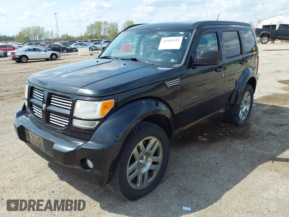 2011 Dodge Nitro Heat with VIN 1D4PU4GX9BW607580, listed as a IAAI auction lot 42105529 with 143,795 mi miles. Bid and sale history available at carsss.com. Image 2.