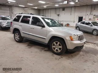 2009 Jeep Grand Cherokee Laredo with VIN 1J8GR48K89C553694, listed as a IAAI auction lot 41984820 with 196,266 mi miles. Bid and sale history available at carsss.com. Image 1.