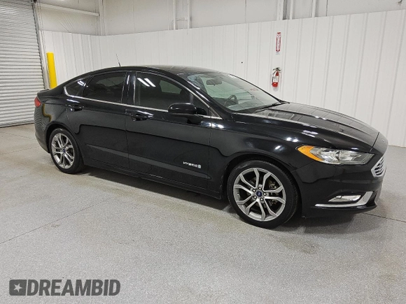 2017 Ford Fusion Hybrid SE with VIN 3FA6P0LU9HR216757, listed as a Copart auction lot 64430315 with 106,247 mi miles and Clean title. Bid and sale history available at DreamBid. Image 4.