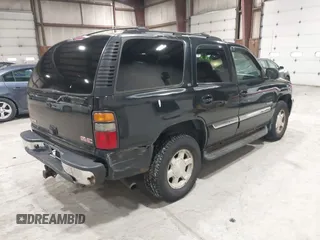 2005 GMC Yukon SLT with VIN 1GKEK13T15J143363, listed as a IAAI auction lot 41996424 with 272,819 mi miles. Bid and sale history available at carsss.com. Image 4.