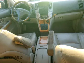 2007 Lexus RX 350 z VIN 2T2GK31U07C003715, wystawiony jako Copart lot #77165994 z przebiegiem 206 083 mil mil oraz Czysty tytuł • Clean title. Historia ofert i sprzedaży dostępna na DreamBid. Obrazek 8.