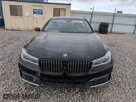 2017 BMW 7 Series 750i с VIN WBA7F0C35HGM21697, выставлен на аукционе Copart как лот 54713825 с пробегом Не указан миль и Списание • Salvage title. История ставок и продаж доступна на DreamBid. Изображение 5.