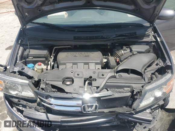 2016 Honda Odyssey EX-L with VIN 5FNRL5H60GB056665, listed as a Copart auction lot 53809485 with 189,197 mi miles and Salvage Title. Bid and sale history available at carsss.com. Image 12.
