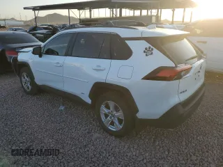 2021 Toyota RAV4 Hybrid XLE with VIN JTMRWRFV0MD117606, listed as a Copart auction lot 52412695 with 64,682 mi miles and Salvage Title. Bid and sale history available at carsss.com. Image 2.