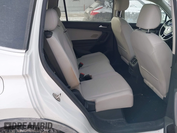 2019 Volkswagen Tiguan SE with VIN 3VV3B7AX7KM040136, listed as a IAAI auction lot 41397714 with 82,302 mi miles and . Bid and sale history available at DreamBid. Image 8.