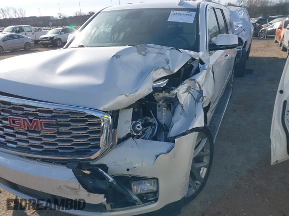 2020 GMC Yukon XL Denali with VIN 1GKS1HKJ6LR282854, listed as a IAAI auction lot 41717072 with 56,715 mi miles and . Bid and sale history available at DreamBid. Image 6.