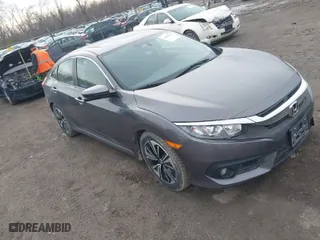 2016 Honda Civic Sedan EX-T with VIN 2HGFC1F33GH651090, listed as a IAAI auction lot 41948432 with NaN miles. Bid and sale history available at carsss.com. Image 1.