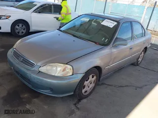 1999 Honda Civic EX with VIN 2HGEJ8640XH505636, listed as a IAAI auction lot 41629850 with 369,637 mi miles. Bid and sale history available at carsss.com. Image 2.
