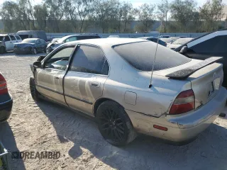 1995 Honda Accord LX with VIN JHMCD563XSC033376, listed as a Copart auction lot 73887924 with 129,069 mi miles and Salvage Title. Bid and sale history available at carsss.com. Image 2.