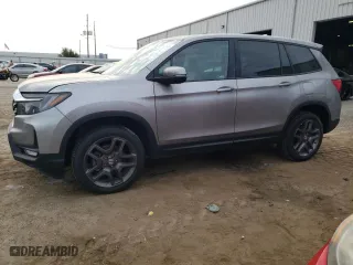 2022 Honda Passport EX-L with VIN 5FNYF8H50NB030141, listed as a Copart auction lot 66890013 with 0 mi miles. Bid and sale history available at carsss.com. Image 1.