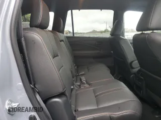 2022 Honda Pilot TrailSport z VIN 5FNYF6H81NB020409, wystawiony jako Copart lot #56401885 z przebiegiem 28 744 mil mil oraz Szkoda całkowita • Salvage title. Historia ofert i sprzedaży dostępna na DreamBid. Obrazek 11.