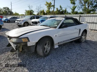 2002 Ford Mustang Deluxe with VIN 1FAFP44492F121223, listed as a Copart auction lot 62474065 with 128,984 mi miles and Salvage title. Bid and sale history available at DreamBid. Image 1.