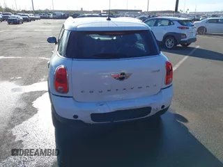 2013 MINI Countryman with VIN WMWZB3C52DWR35806, listed as a IAAI auction lot 42184010 with 93,380 mi miles and . Bid and sale history available at DreamBid. Image 6.