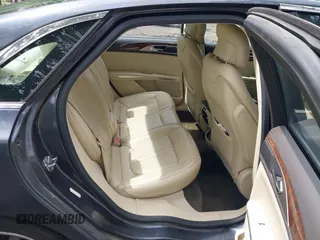 2013 Lincoln MKZ with VIN 3LN6L2J98DR817275, listed as a IAAI auction lot 42196186 with 128,456 mi miles. Bid and sale history available at carsss.com. Image 8.