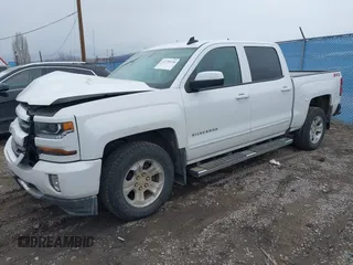 2018 Chevrolet Silverado 1500 LT with VIN 3GCUKREC0JG594914, listed as a IAAI auction lot 41735134 with 98,407 mi miles. Bid and sale history available at carsss.com. Image 2.
