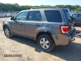 2012 Ford Escape XLT z VIN 1FMCU9DG7CKB28270, wystawiony jako IAAI lot #42607520 z przebiegiem 129 758 mil mil oraz . Historia ofert i sprzedaży dostępna na DreamBid. Obrazek 3.