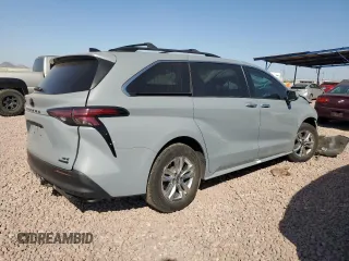 2022 Toyota Sienna XLE Woodland Edition with VIN 5TDASKFC4NS043580, listed as a Copart auction lot 74021884 with 153,893 mi miles and Salvage Title. Bid and sale history available at carsss.com. Image 3.