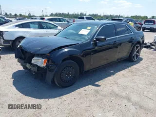 2012 Chrysler 300 with VIN 2C3CCAAG3CH112592, listed as a IAAI auction lot 42070481 with 178,980 mi miles. Bid and sale history available at carsss.com. Image 2.