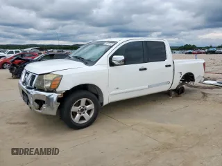 2005 Nissan Titan LE with VIN 1N6BA07A45N572068, listed as a Copart auction lot 58378445 with 219,838 mi miles and Salvage title. Bid and sale history available at DreamBid. Image 1.