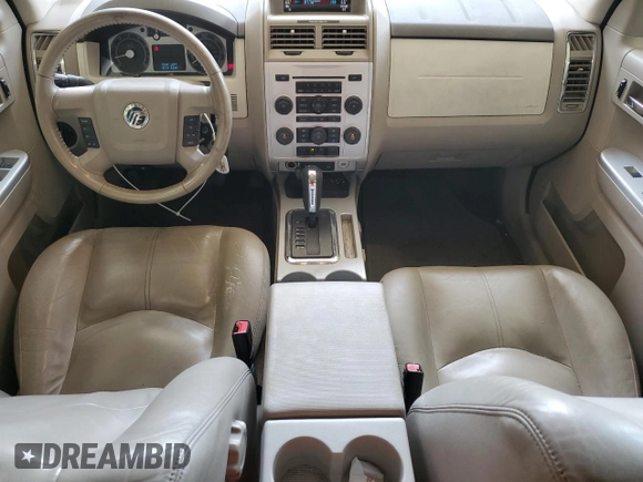 2008 Mercury Mariner Premier with VIN 4M2CU87108KJ13679, listed as a Copart auction lot 56635785 with 166,732 mi miles and Salvage title. Bid and sale history available at DreamBid. Image 8.