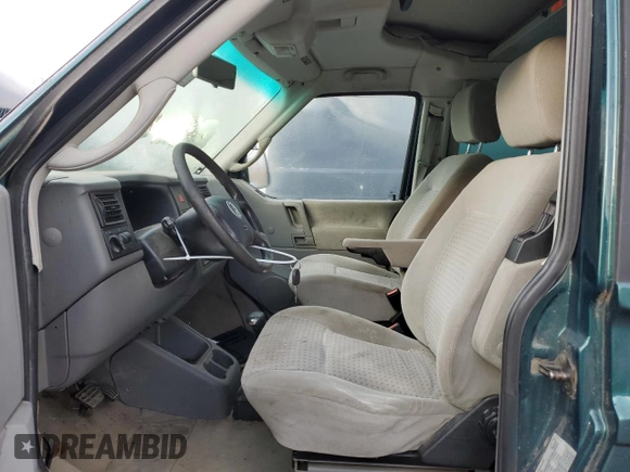 2002 Volkswagen EuroVan MV с VIN WV2NB47092H095600, выставлен на аукционе Copart как лот 50705065 с пробегом 223 049 миль миль и Чистый • Clean title. История ставок и продаж доступна на DreamBid. Изображение 7.