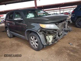 2012 Kia Sorento LX with VIN 5XYKT3A16CG291837, listed as a IAAI auction lot 41802670 with 184,287 mi miles. Bid and sale history available at carsss.com. Image 1.