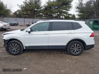 2020 Volkswagen Tiguan SE with VIN 3VV2B7AX0LM075033, listed as a IAAI auction lot 41310056 with 82,548 mi miles. Bid and sale history available at carsss.com. Image 14.
