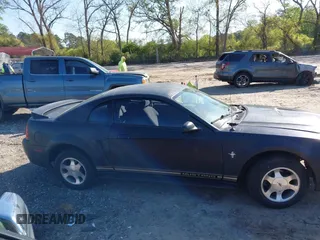 2000 Ford Mustang z VIN 1FAFP404XYF217165, wystawiony jako IAAI lot #41997215 z przebiegiem Nie podano mil oraz . Historia ofert i sprzedaży dostępna na DreamBid. Obrazek 13.
