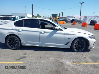 2023 BMW 5 Series 530e with VIN WBA13AG09PCM41820, listed as a IAAI auction lot 42409541 with 17,715 mi miles and . Bid and sale history available at DreamBid. Image 12.