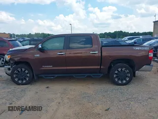 2014 Toyota Tundra Limited with VIN 5TFHW5F19EX400636, listed as a IAAI auction lot 42626818 with 267,402 mi miles and . Bid and sale history available at DreamBid. Image 14.