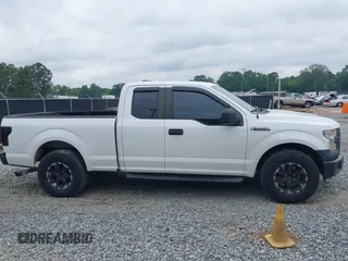 2015 Ford F-150 XL with VIN 1FTEX1C8XFFA75822, listed as a IAAI auction lot 42430498 with 197,181 mi miles and . Bid and sale history available at DreamBid. Image 13.