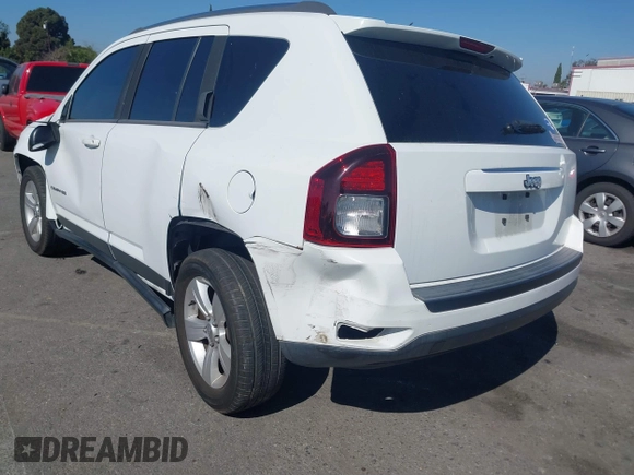 2015 Jeep Compass Sport with VIN 1C4NJCBB0FD122085, listed as a IAAI auction lot 41599772 with 98,155 mi miles. Bid and sale history available at carsss.com. Image 3.