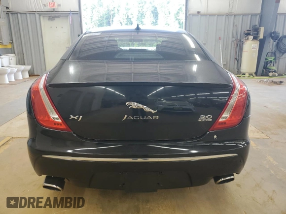 2015 Jaguar XJ with VIN SAJWJ1CD9F8V83885, listed as a Copart auction lot 65625135 with 81,794 mi miles and Clean title. Bid and sale history available at DreamBid. Image 6.