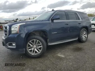 2017 GMC Yukon SLT with VIN 1GKS1BKC5HR295827, listed as a Copart auction lot 48189565 with 106,867 mi miles and Salvage Title. Bid and sale history available at carsss.com. Image 1.