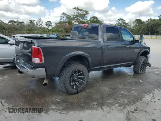 2014 Ram 2500 Laramie with VIN 3C6UR5FL0EG148066, listed as a Copart auction lot 42795415 with 202,415 mi miles and Salvage Title. Bid and sale history available at carsss.com. Image 3.