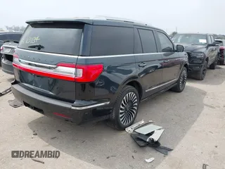 2021 Lincoln Navigator Black Label z VIN 5LMJJ2TT6MEL13834, wystawiony jako IAAI lot #41801640 z przebiegiem 59 843 mil mil oraz . Historia ofert i sprzedaży dostępna na DreamBid. Obrazek 4.