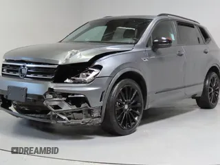 2020 Volkswagen Tiguan SE z VIN 3VV3B7AXXLM154326, wystawiony jako Copart lot #59328395 z przebiegiem 62 793 mil mil oraz Czysty tytuł • Clean title. Historia ofert i sprzedaży dostępna na DreamBid. Obrazek 2.