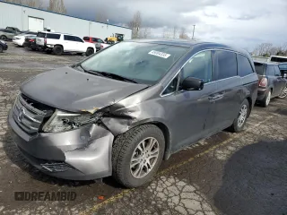 2013 Honda Odyssey EX-L with VIN 5FNRL5H62DB084429, listed as a Copart auction lot 49094335 with 129,423 mi miles and Salvage Title. Bid and sale history available at carsss.com. Image 1.