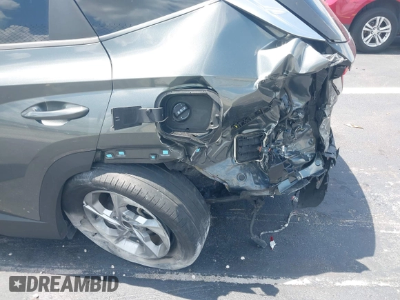 2022 Hyundai Tucson SEL with VIN 5NMJB3AE3NH069301, listed as a IAAI auction lot 42366081 with 26,971 mi miles and . Bid and sale history available at DreamBid. Image 6.