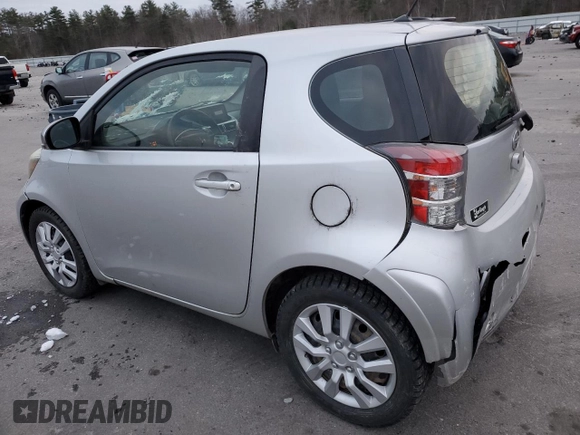 2012 Scion iQ with VIN JTNJJXB03CJ018641, listed as a Copart auction lot 82653104 with 118,617 mi miles and Salvage Title. Bid and sale history available at carsss.com. Image 2.