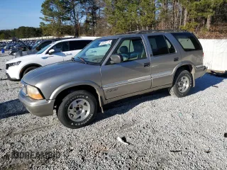 2000 GMC Jimmy SL with VIN 1GKCS13WXY2295240, listed as a Copart auction lot 88526175 with 287,927 mi miles and Salvage Title. Bid and sale history available at carsss.com. Image 1.