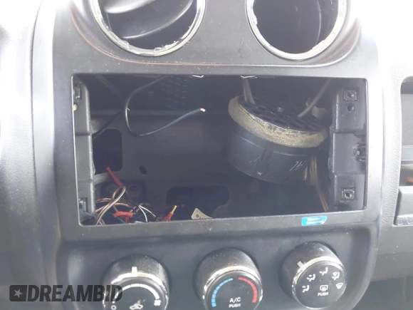 2014 Jeep Patriot Sport with VIN 1C4NJRBB1ED811019, listed as a IAAI auction lot 42181813 with 124,837 mi miles and . Bid and sale history available at DreamBid. Image 6.