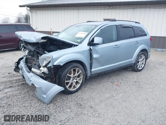 2013 Dodge Journey SXT with VIN 3C4PDDBG2DT579358, listed as a IAAI auction lot 41546005 with 167,489 mi miles and . Bid and sale history available at DreamBid. Image 2.