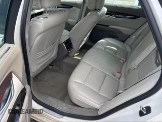 2013 Cadillac XTS Platinum z VIN 2G61V5S33D9173441, wystawiony jako IAAI lot #41902672 z przebiegiem 103 044 mil mil oraz . Historia ofert i sprzedaży dostępna na DreamBid. Obrazek 8.
